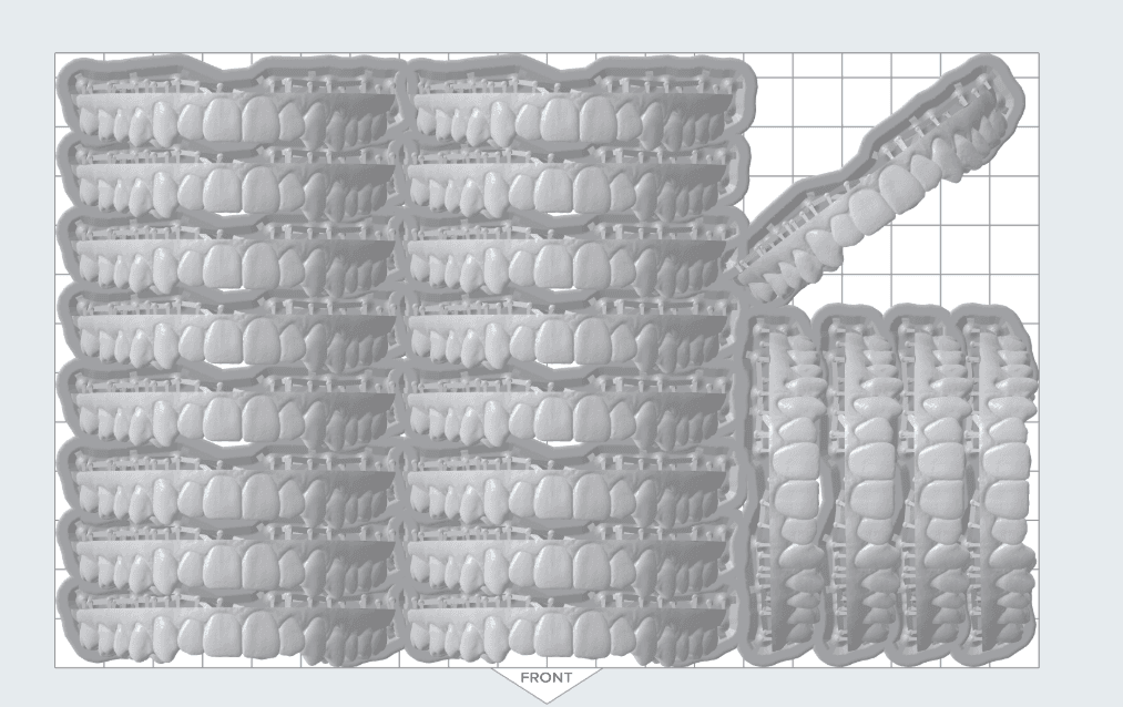 A full build platform of models printed vertically
