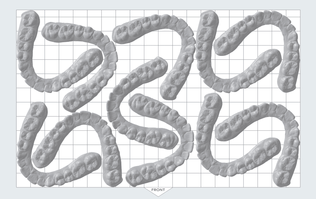 A full build platform of models printed horizontally