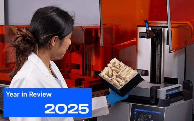 Dental professionals holding a Form 4 Build Platform with restorative models on it. Text over the photo says Year in Review 2025.