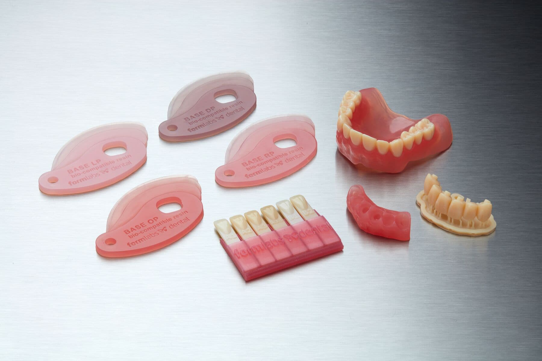 8 Denture Base Resin dentures on a build platform