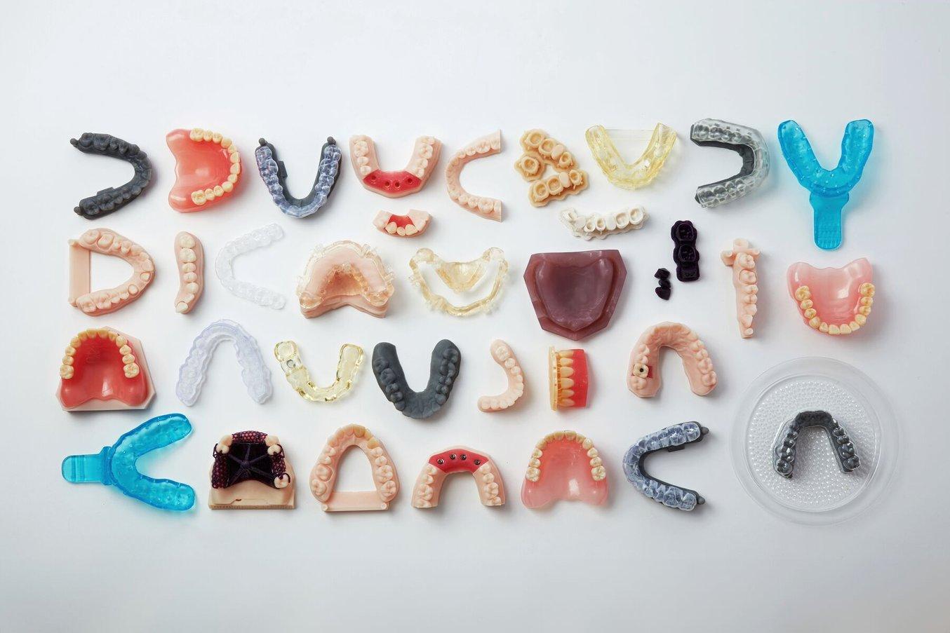 Parti dentali stampate in varie resine