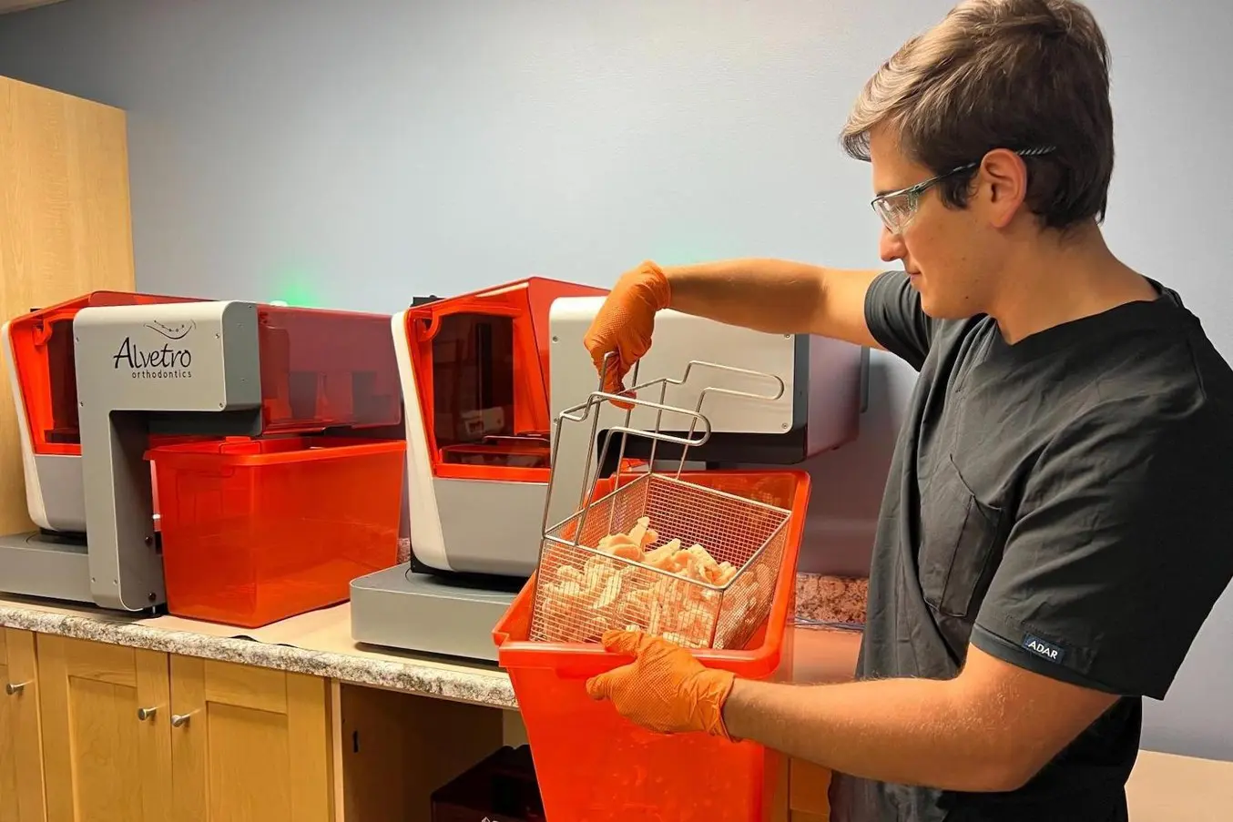 Doctor removing prints from a Form Auto