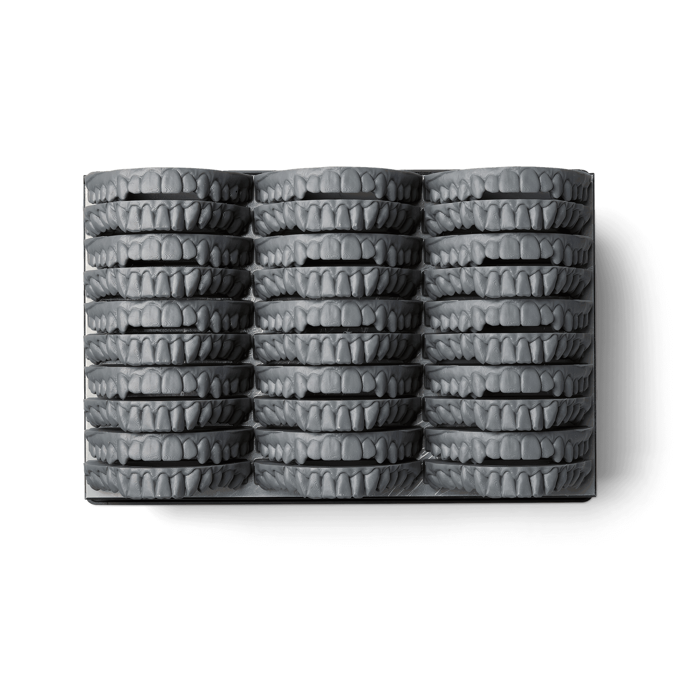 Dental parts printed in Formlabs SLA material Grey Resin
