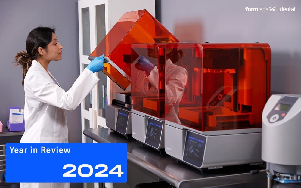 Person lifting cover of Form 4B 3D printer