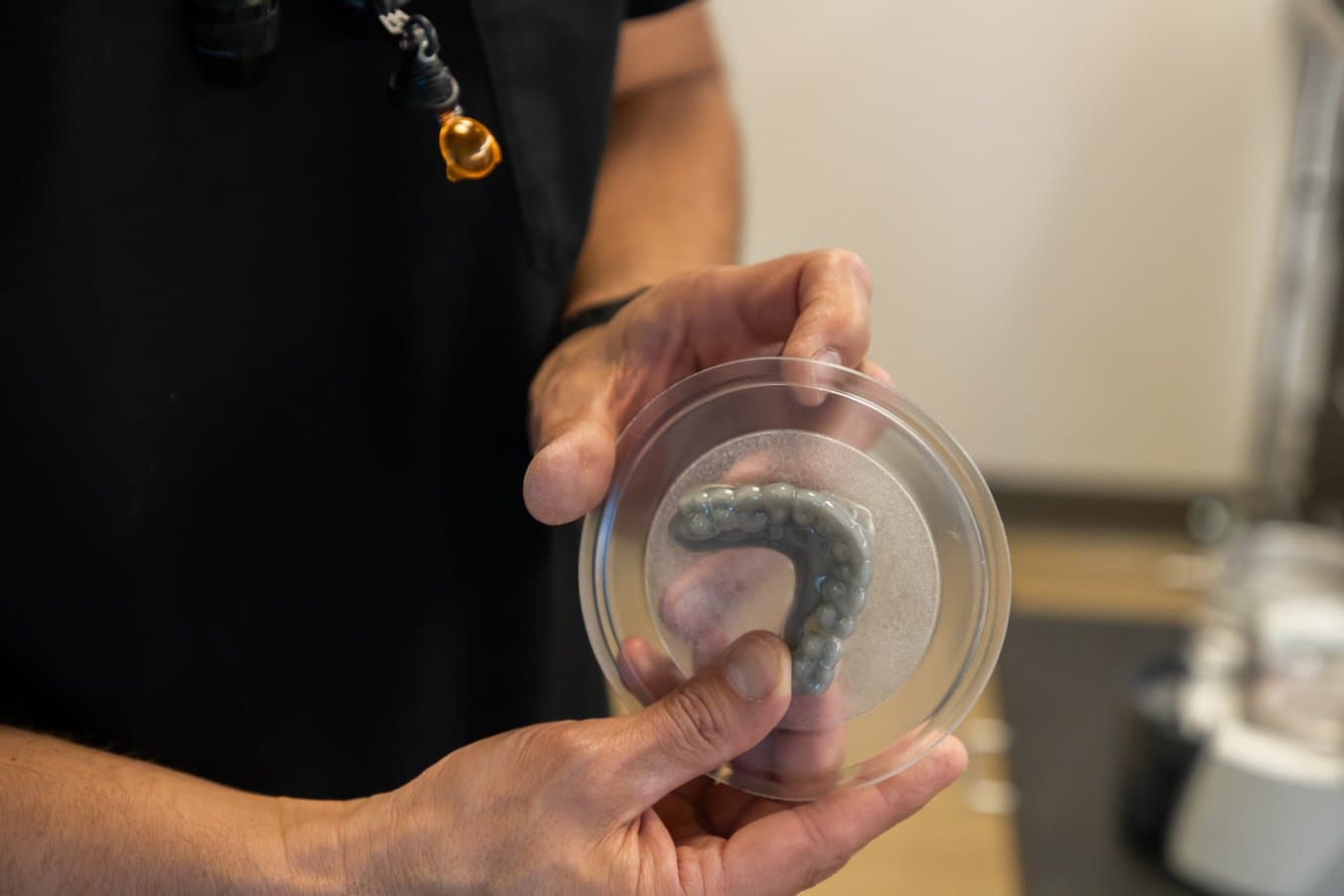 Dr. Baer holding the thermoformed model prior to cutting